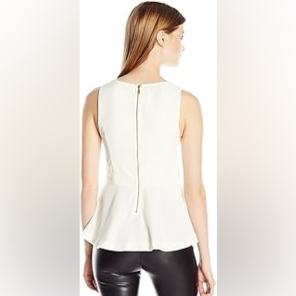 H&M, size XS, white peplum top with long back zipper, fitted. Sleeveless - Picture 1 of 6